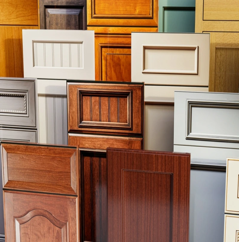 A variety of kitchen cabinet colors, including white, black, gray, and blue.
