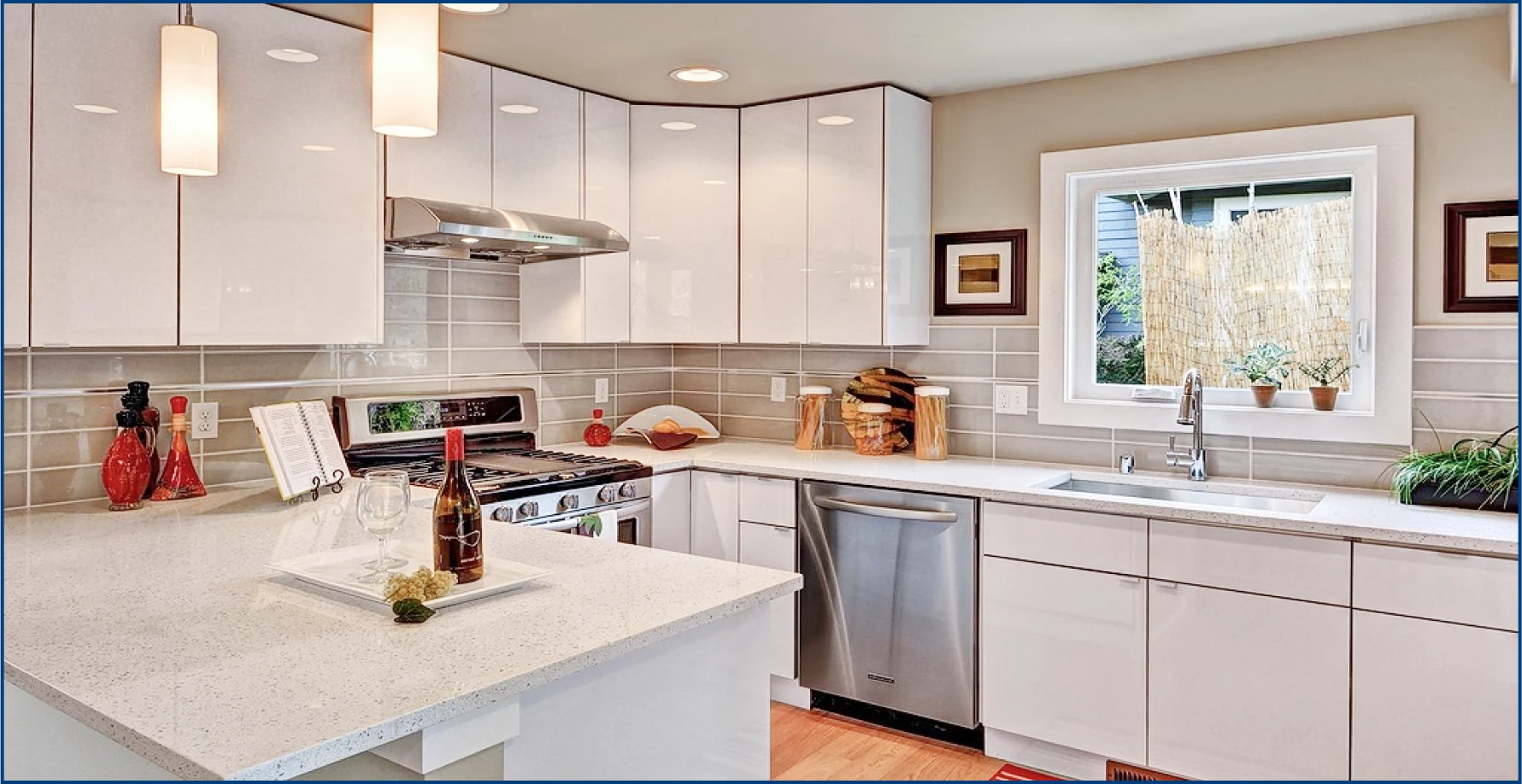 A kitchen with flat-panel white cabinets from Badger Cabinets.
