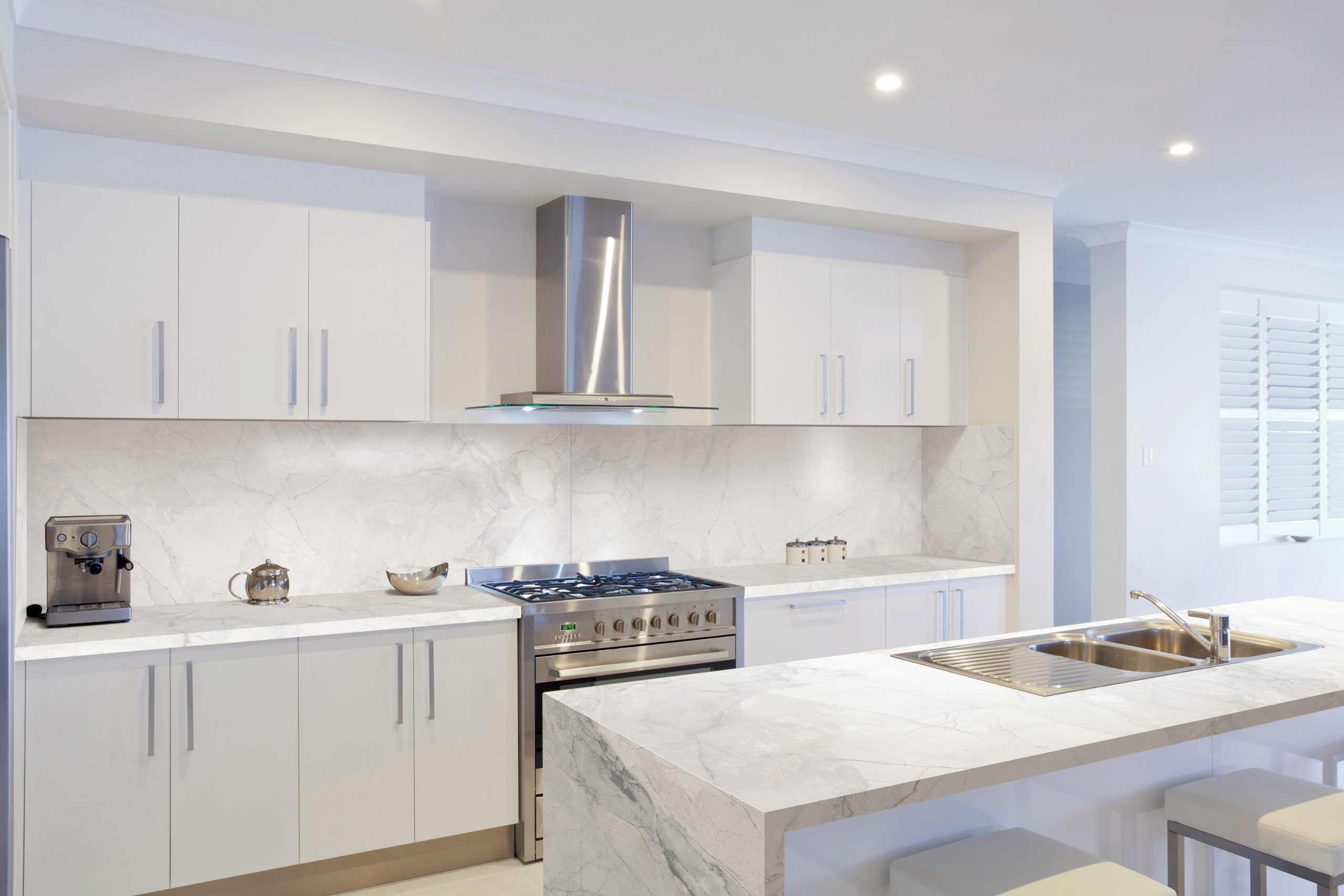 White Kitchen Cabinets with Quartz Countertops